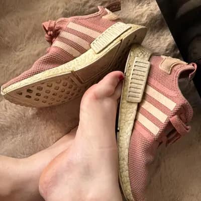 Runtergelatschte Adidas NMD