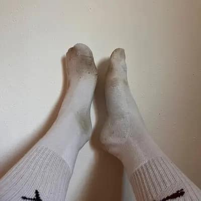 Dreckiges puma Sockenpaar