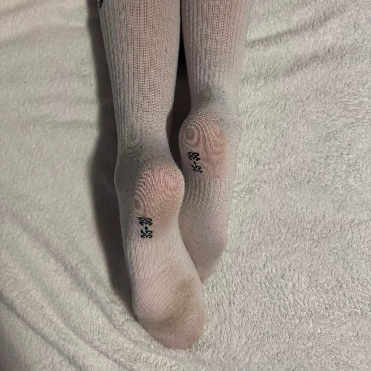 getragene Socken von 19-jähriger