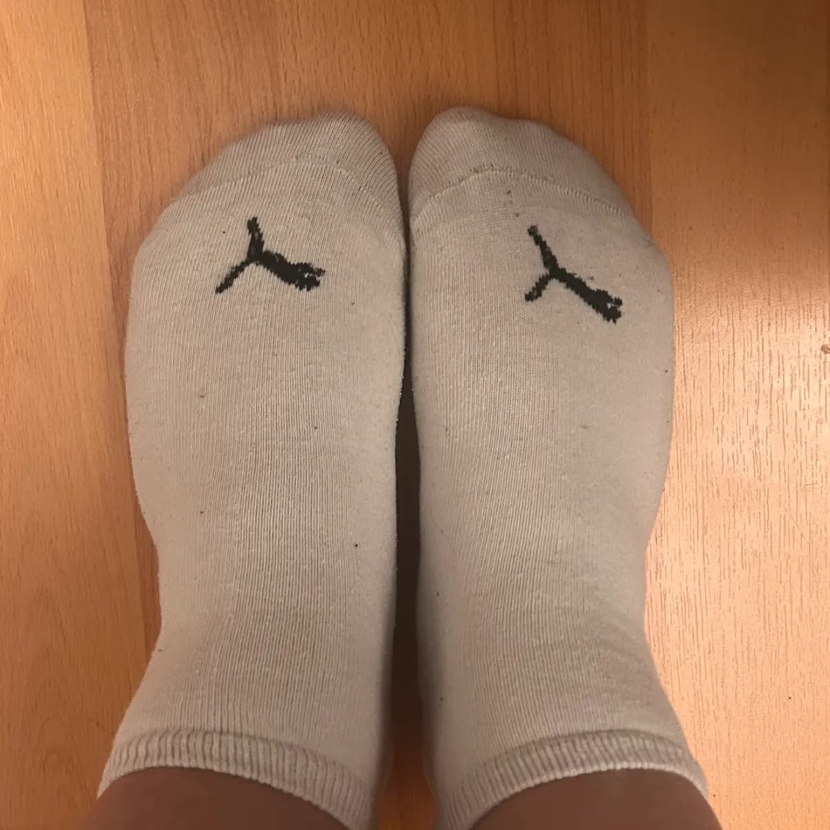 getragene Puma Socken der Größe 40