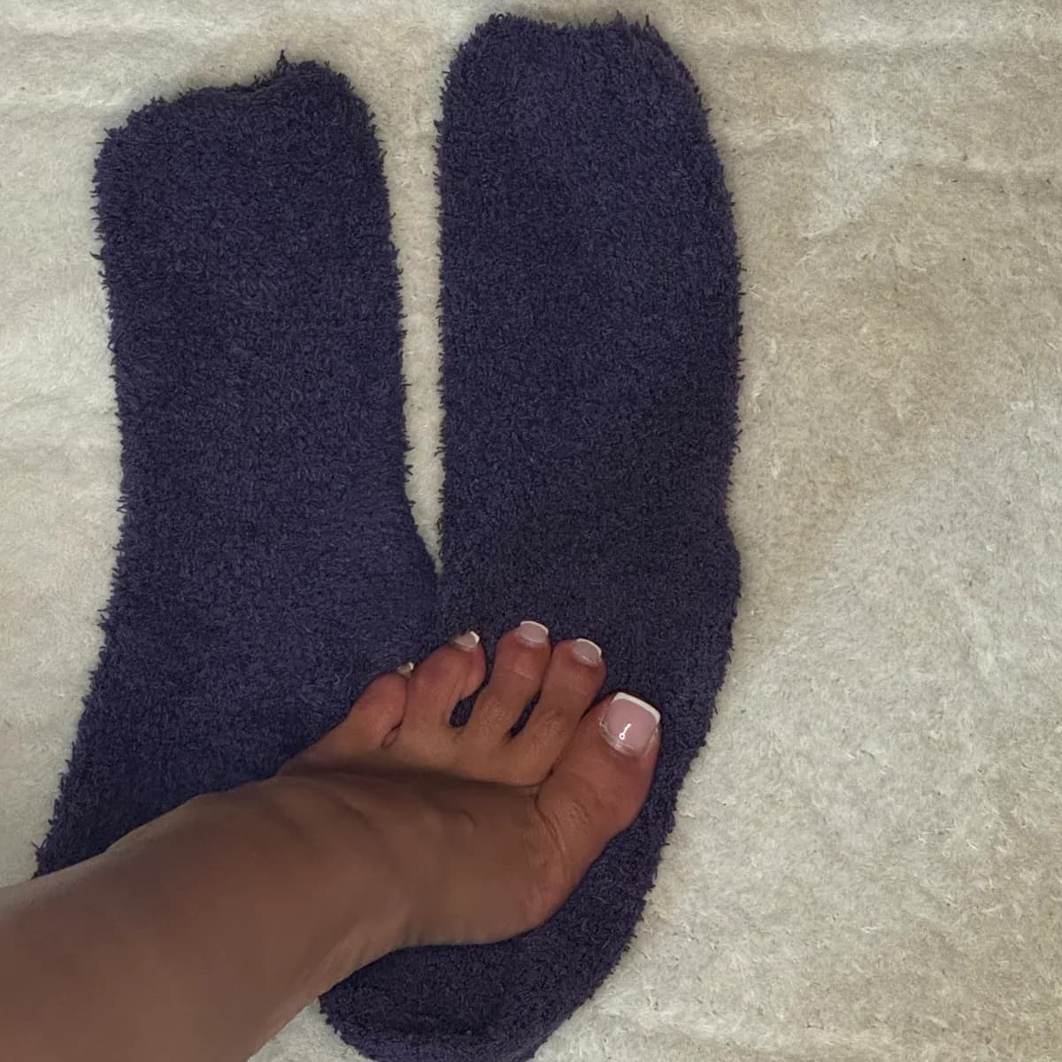 Soft Dark Purple Fuzzy Socks on Feet