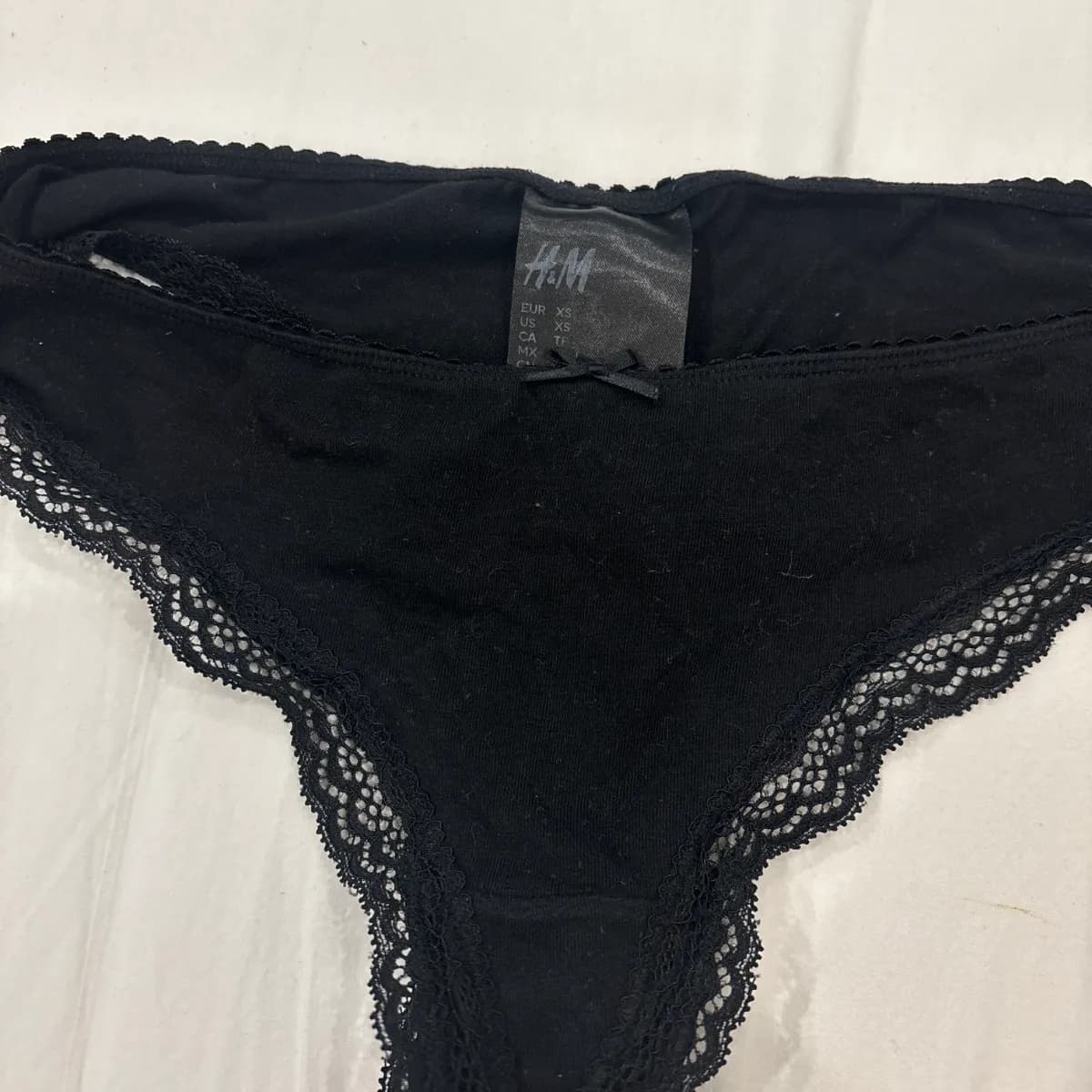 Getragener Schwarzer Slip Größe xs