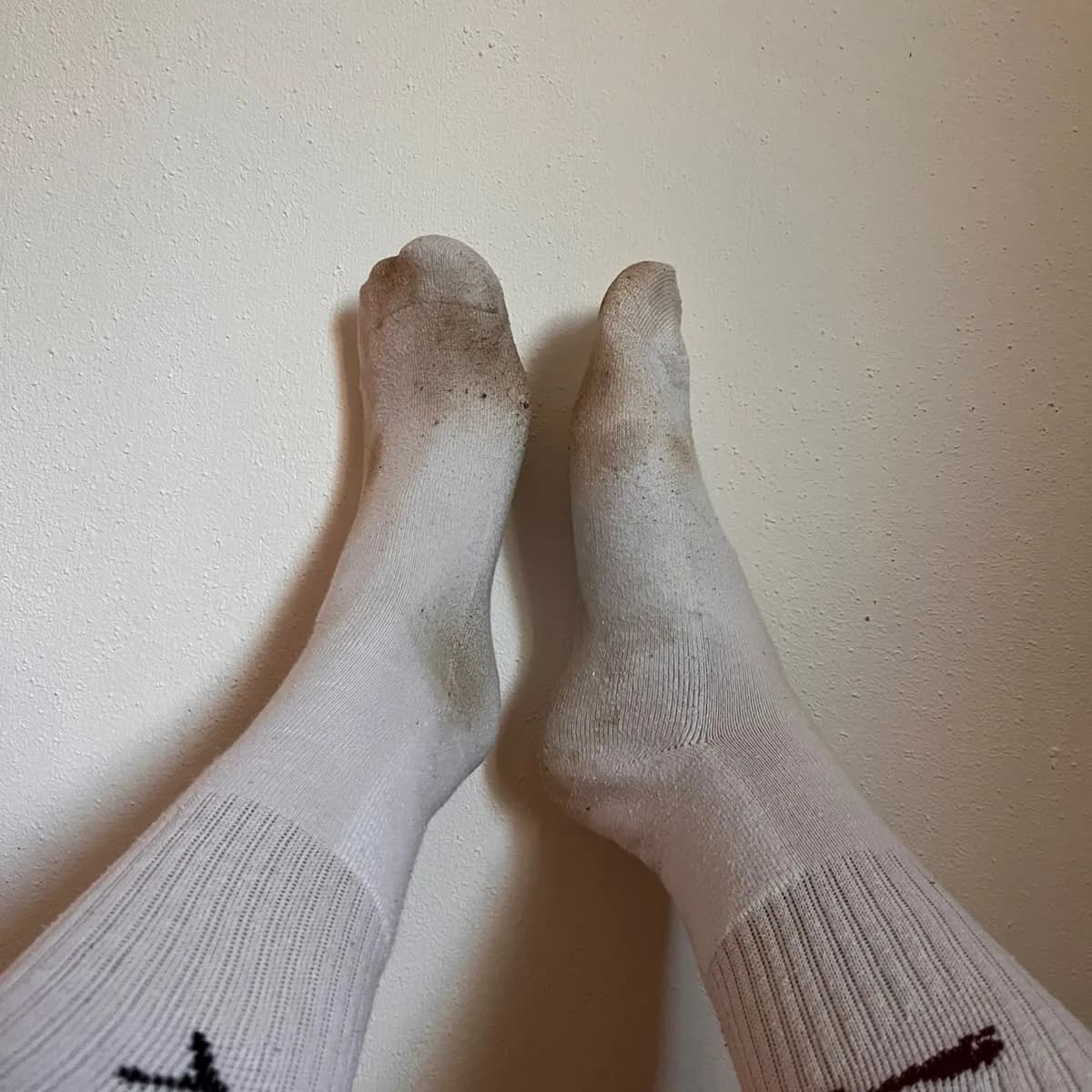 Dreckiges puma Sockenpaar